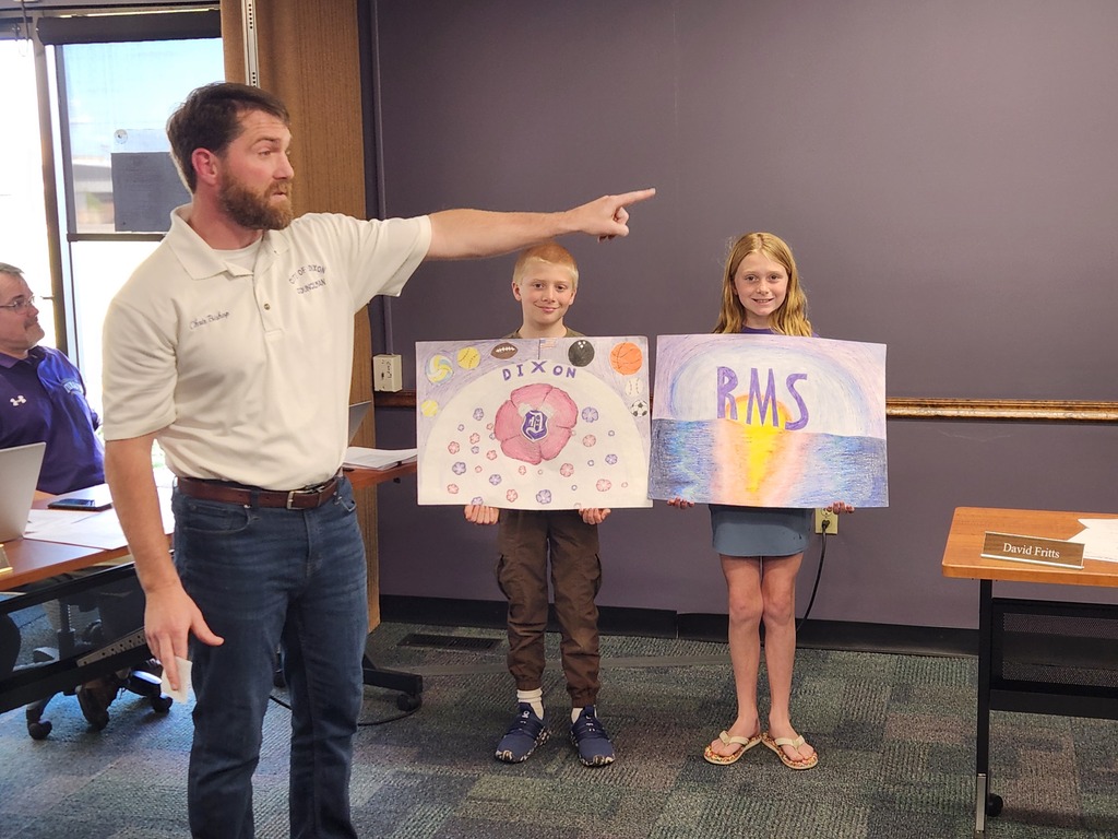 Photo of RMS teacher Bishop with 2 students