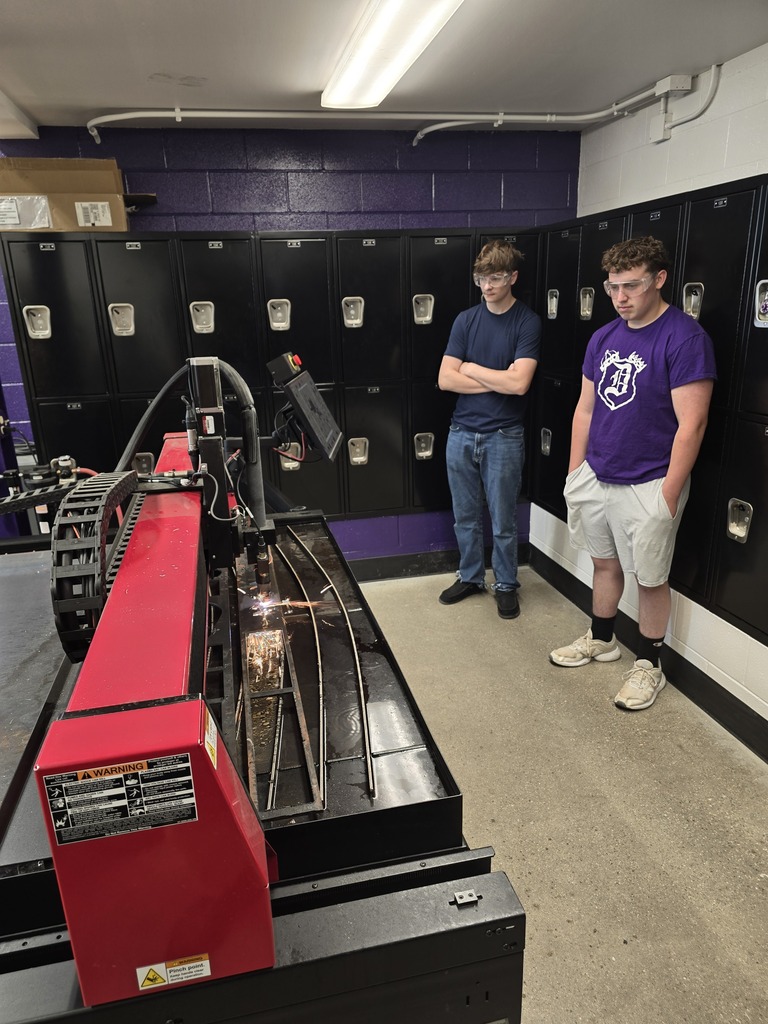 Photo of 2 students with Plasma cutter