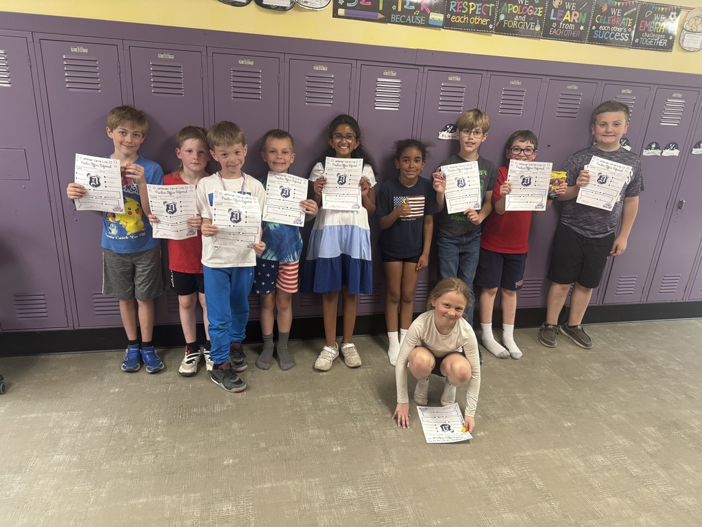 3rd grade students with positive office referral certificates and prizes 