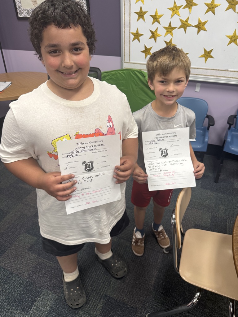 3rd grade students with positive office referral certificates and prizes 