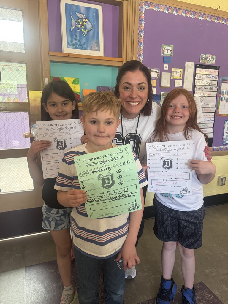 3rd grade students with positive office referral certificates and prizes 
