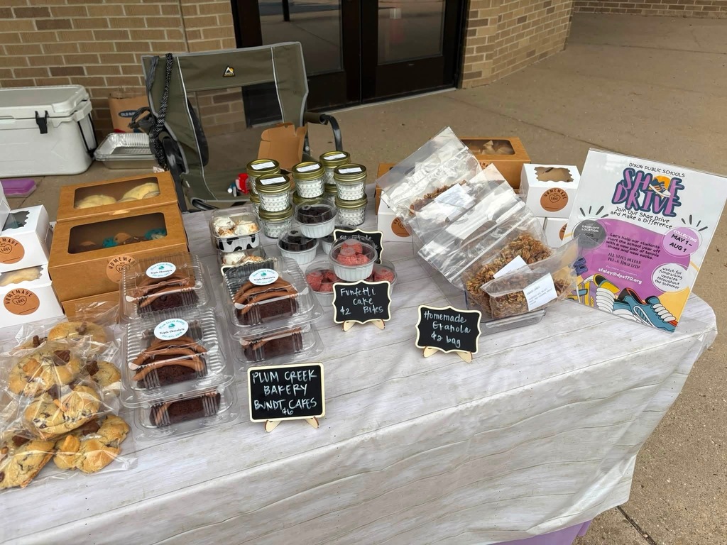 bake sale goods lined up on table top in neat order