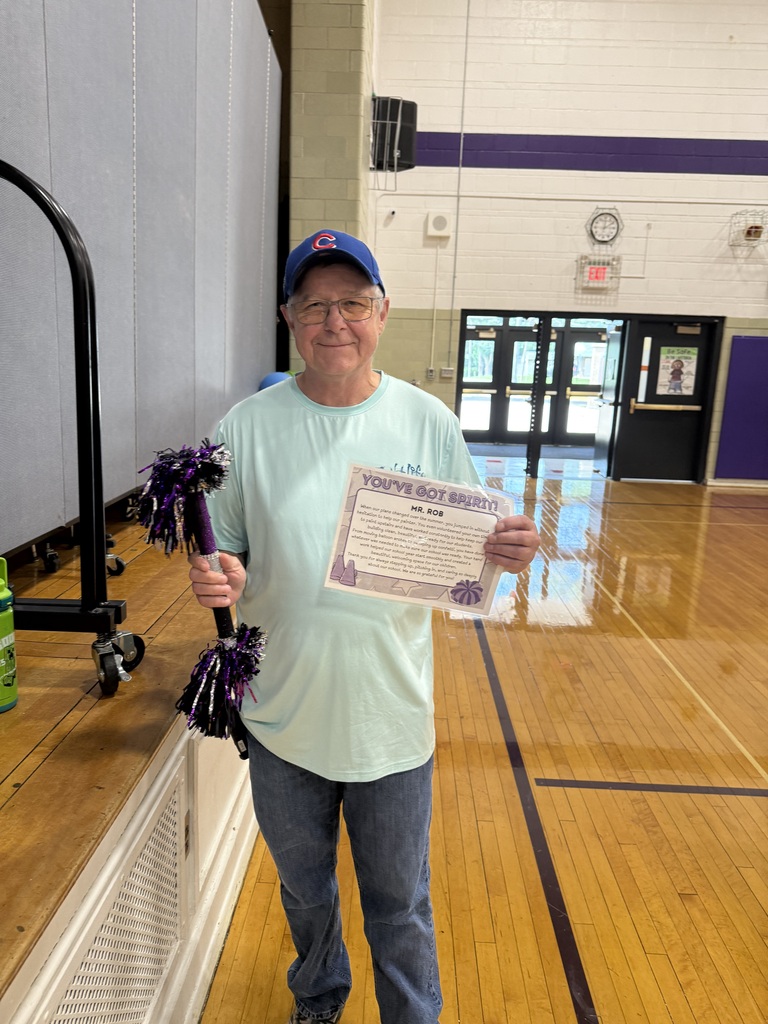 Mr. Rob with the spirit stick and certificate