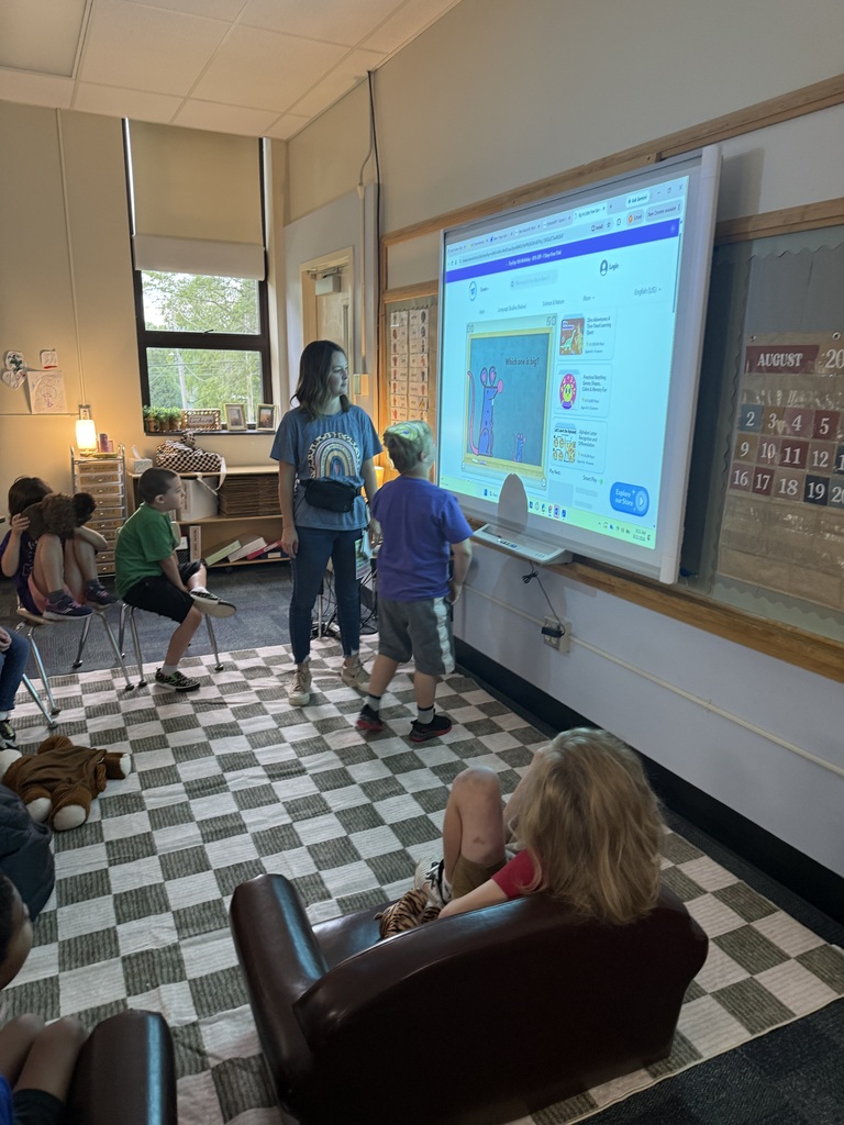 Ms. Cater doing morning meeting