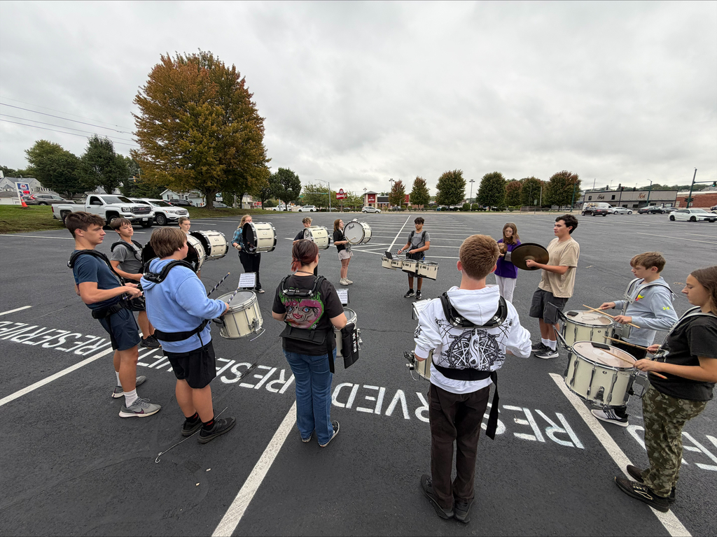 DHS and RMS Band students practicing for football game performance