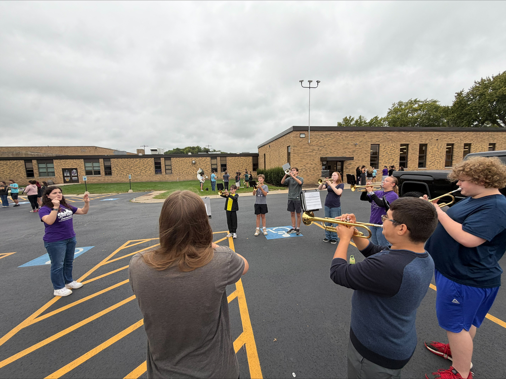 DHS and RMS Band students practicing for football game performance