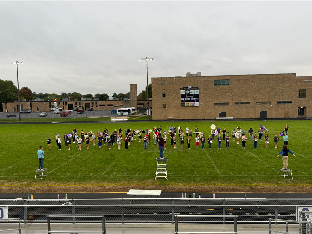 DHS and RMS Band students practicing for football game performance