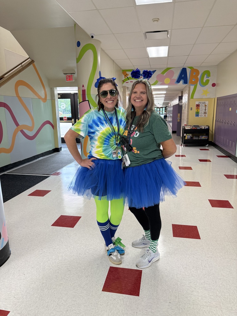 Mrs. thorpe and mrs full in green and blye