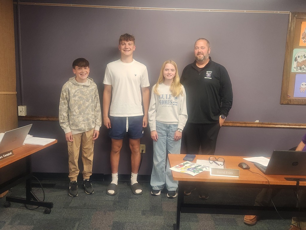 Photo of Principal Magnafici with 3 of our RMS Students of the Month