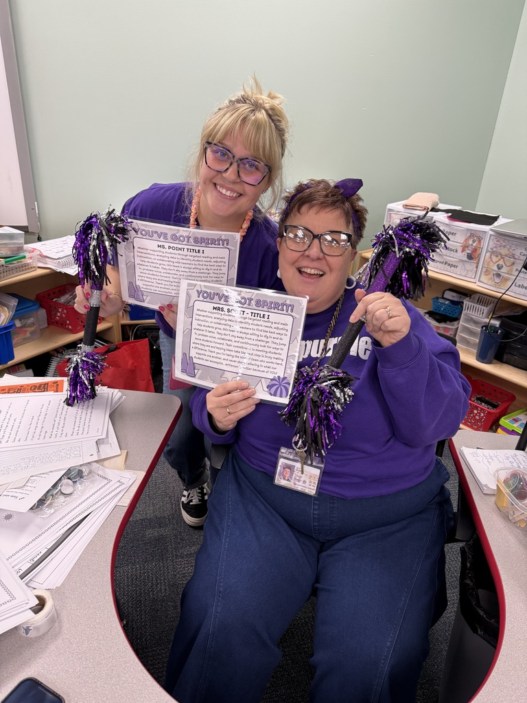 Mrs. scott and mrs. point with the spirit stick