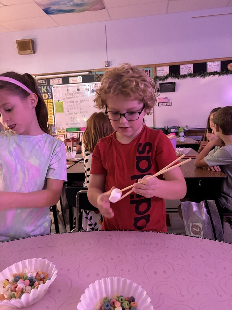 kids using chop sticks 