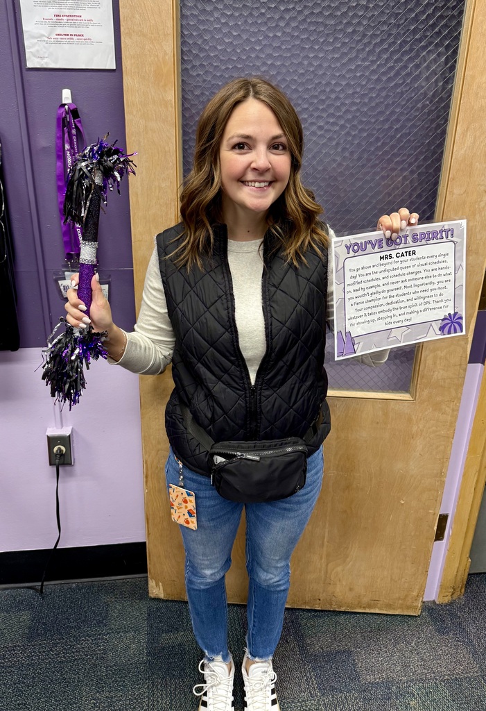 Mrs cater with her spirit stick and certificate