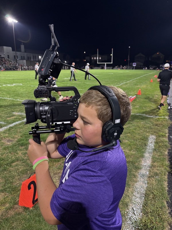 broadcast club students commentating and running the cameras