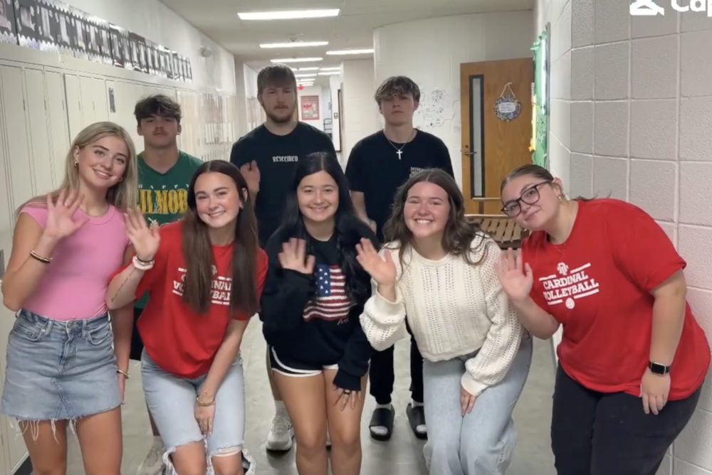 The social media team poses in the halls of DT.