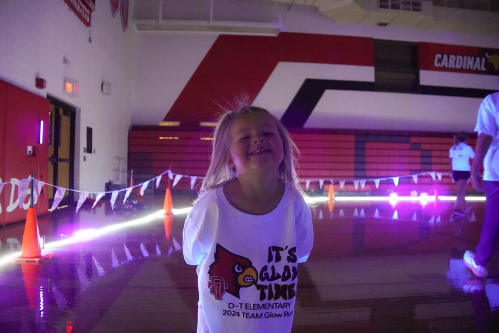 Preschooler Regan Tonniges enjoys last year's glow run.