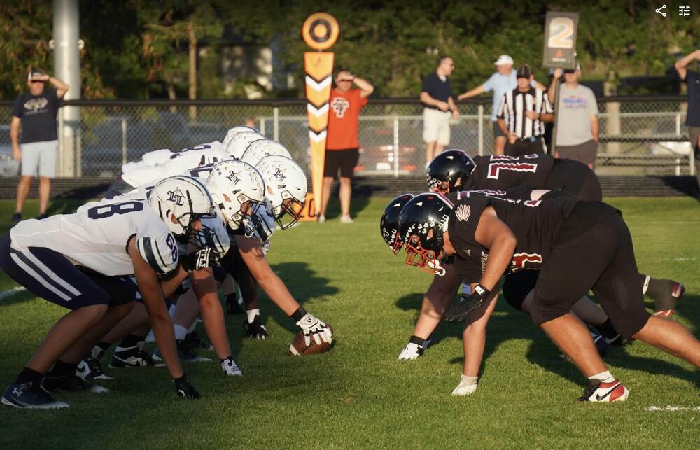 Lincoln Lutheran meets DT at the line of scrimmage.