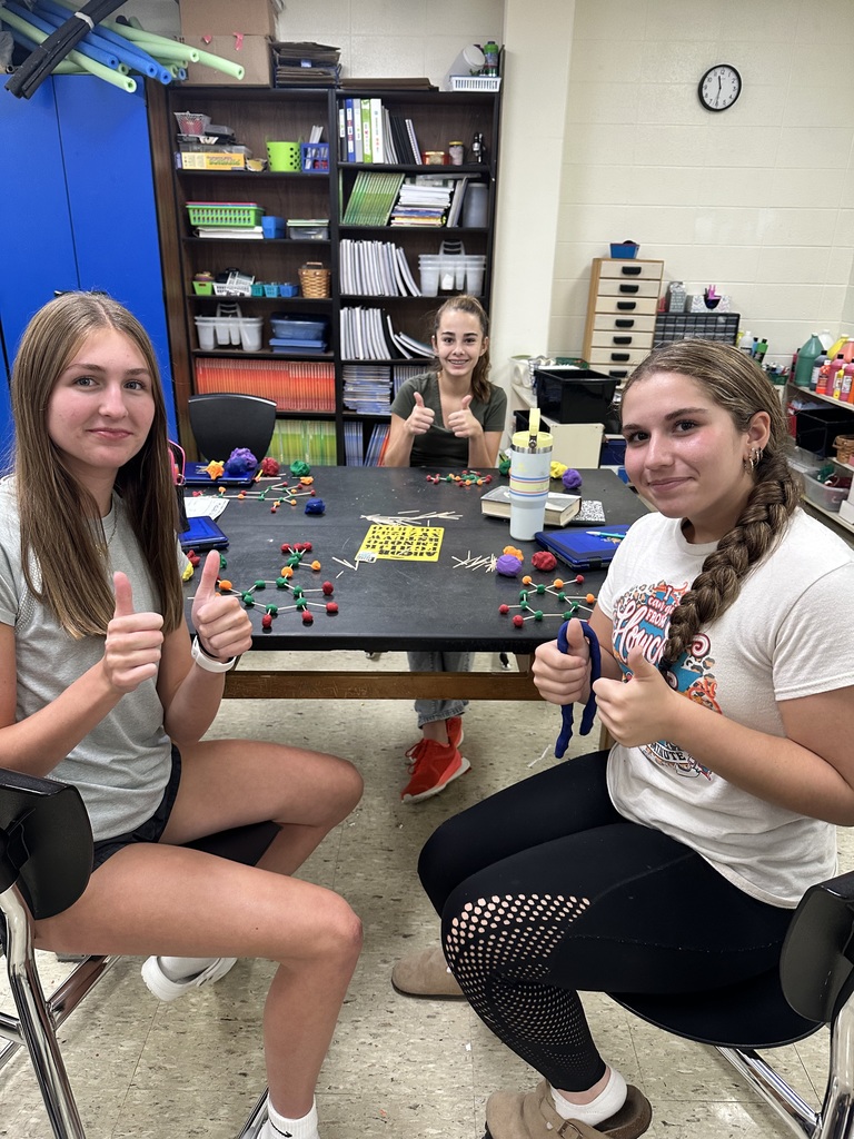 Morgan McCauley and Alexis Thacker are having fun making compounds.