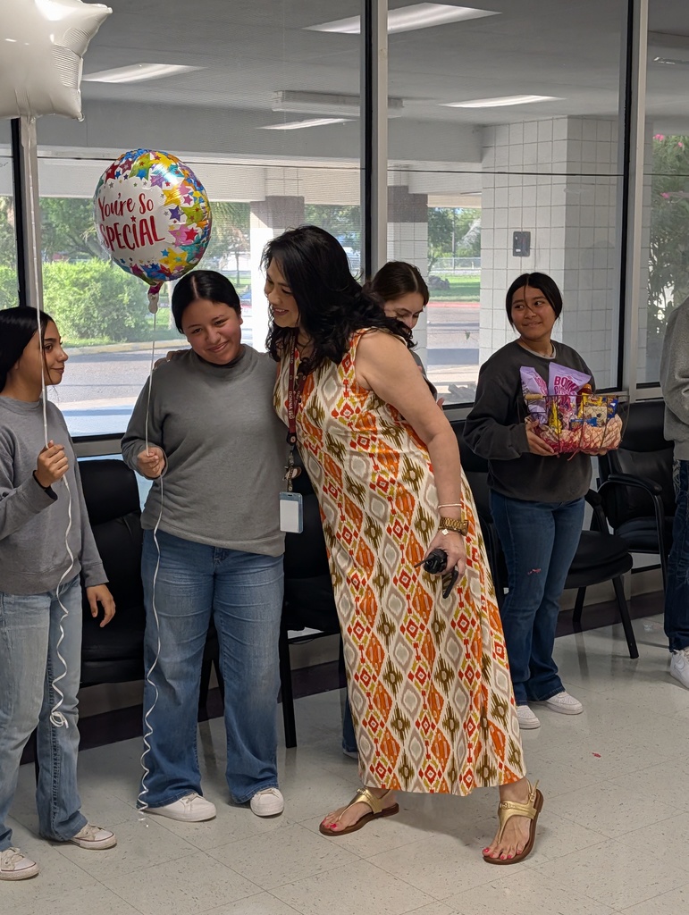 Ms. Zamarron celebrating with students