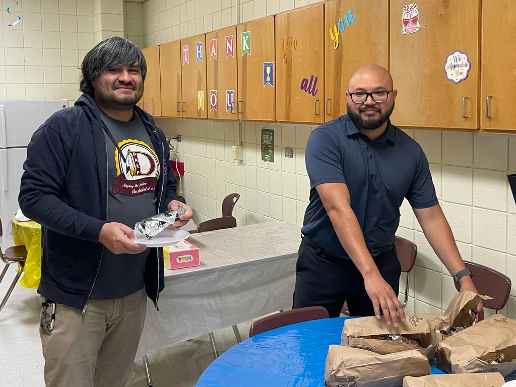 Middle school teachers enjoying breakfast