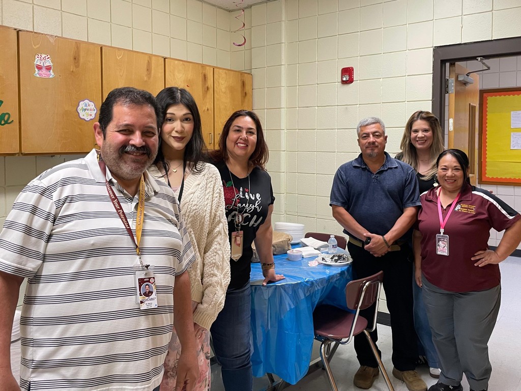 DAEP teachers enjoying teacher appreciation week breakfast