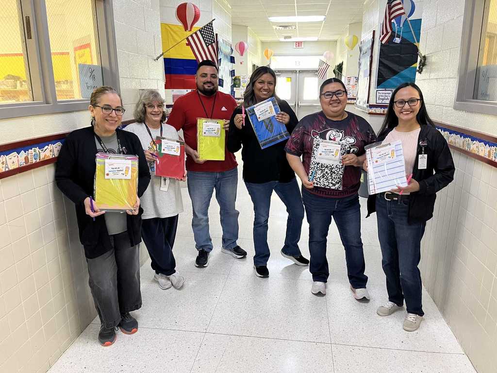 team of six with clipboards