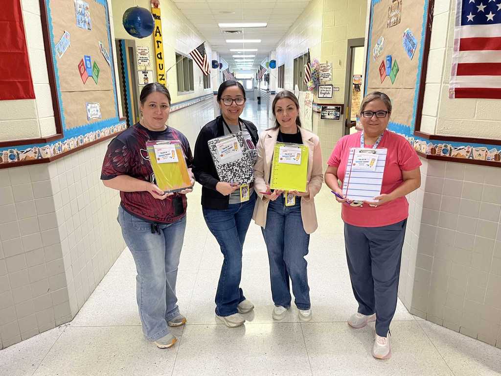 4 woman with clipboards