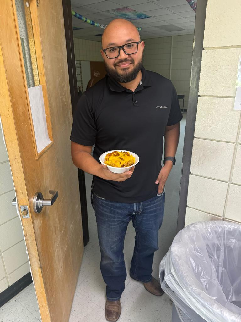 Mr. Cantu enjoying nachos