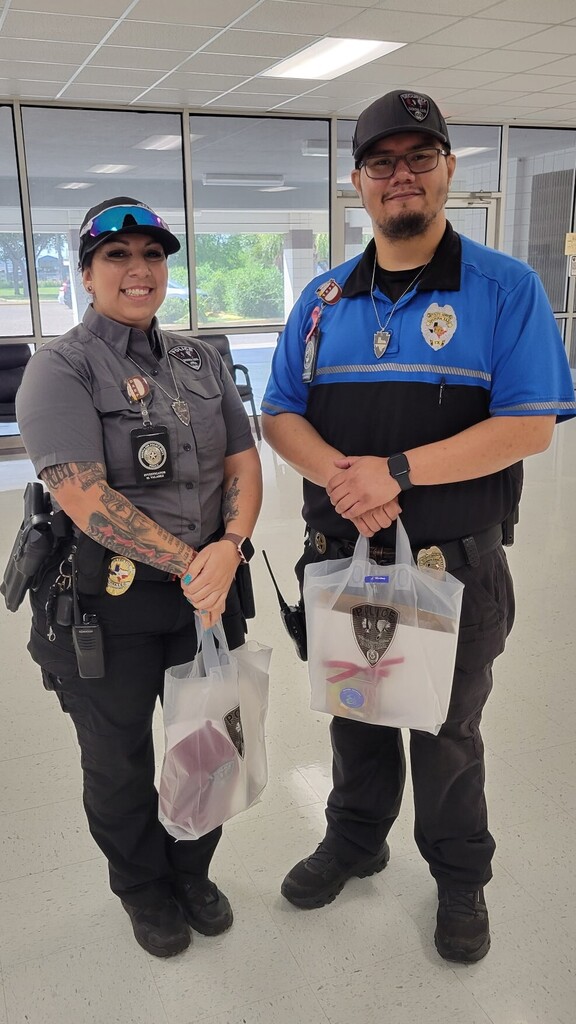 Investigator Valadez and Security Martinez receiving their appreciation gifts. 
