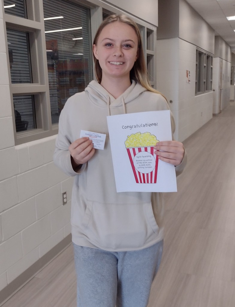 Girl holding prize