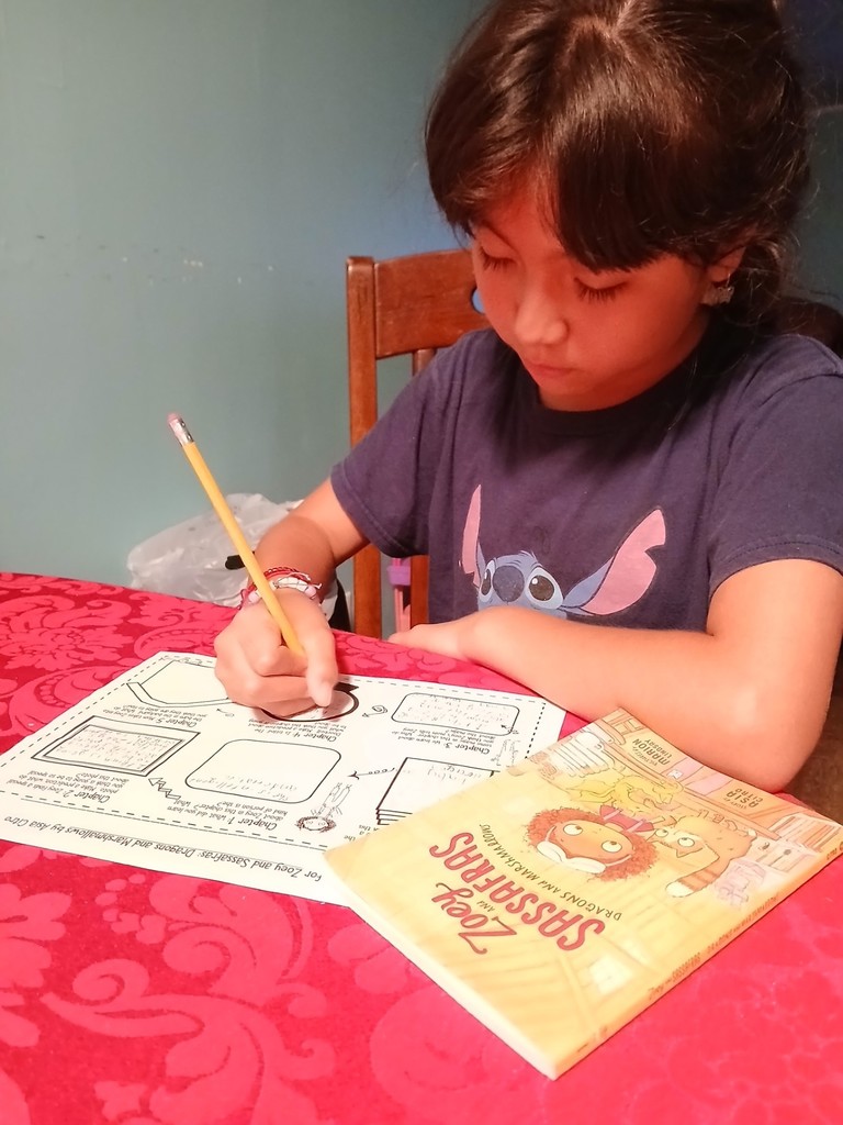 A girl working on a worksheet