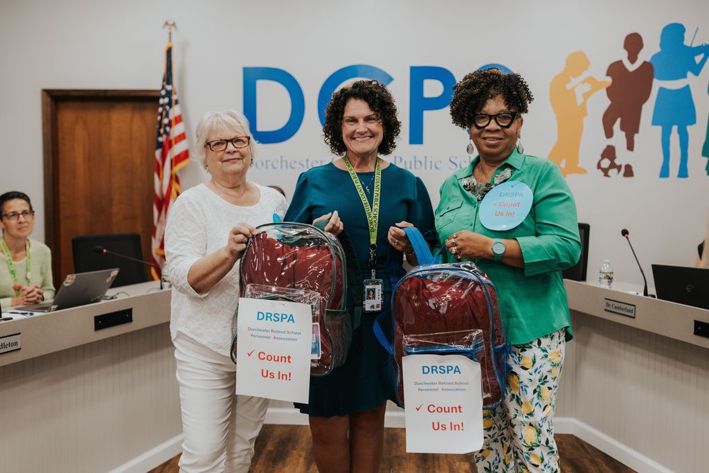 Dorchester Retired School Personnel Association presents clear backpacks to all DCPS elementary and middle schools.
