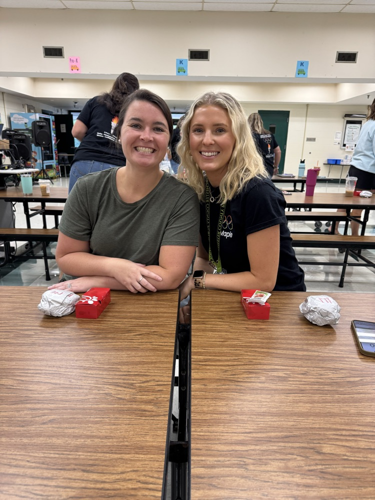 two staff with food