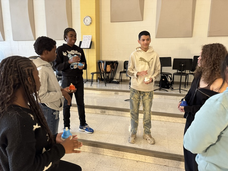 students learn Bells in band
