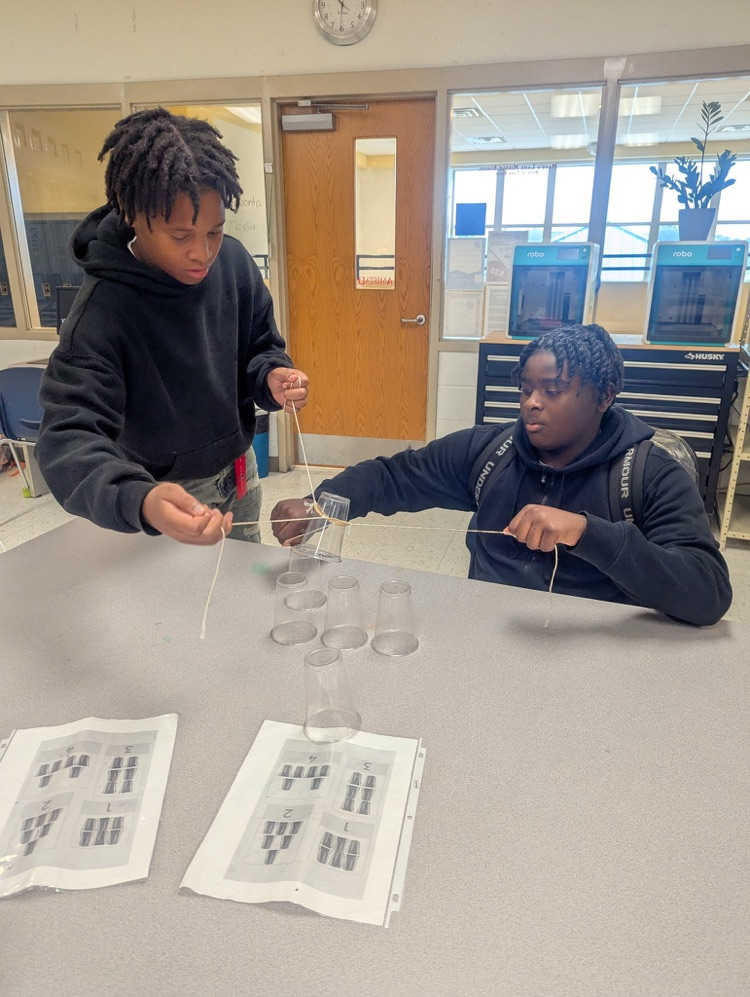 students in PLTW engage in group tasks