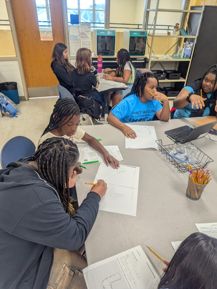 students in PLTW engage in group tasks