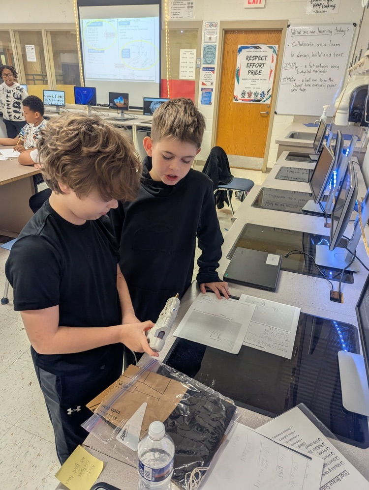 students in PLTW engage in group tasks