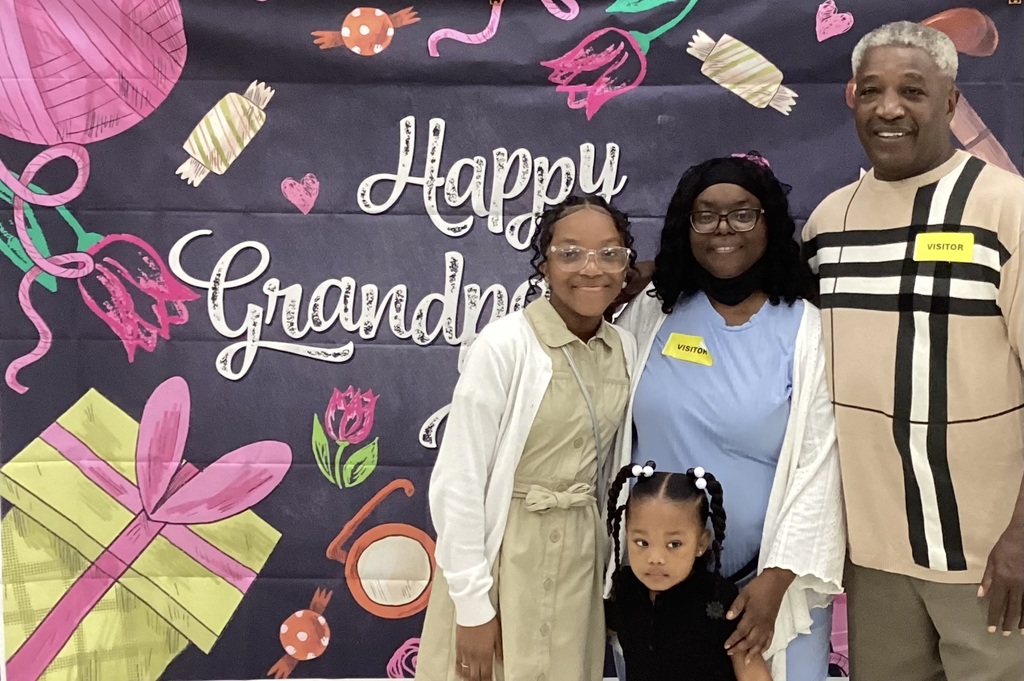 Grandparents pose with grandchildren