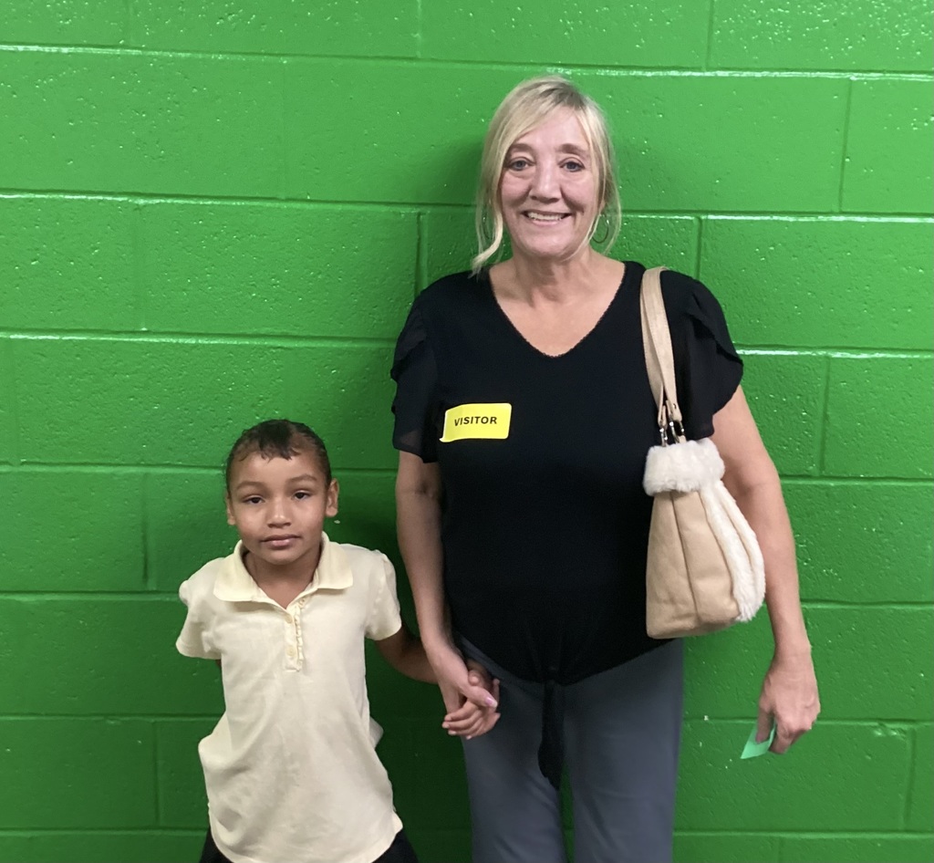 Grandparents pose with grandchildren