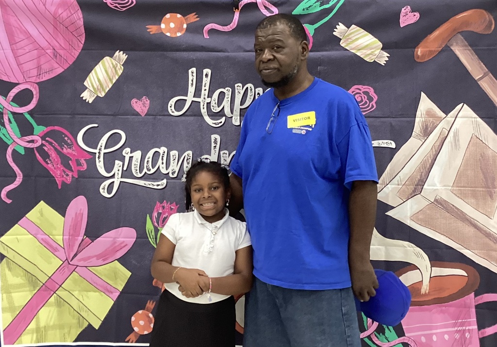 Grandparents pose with grandchildren