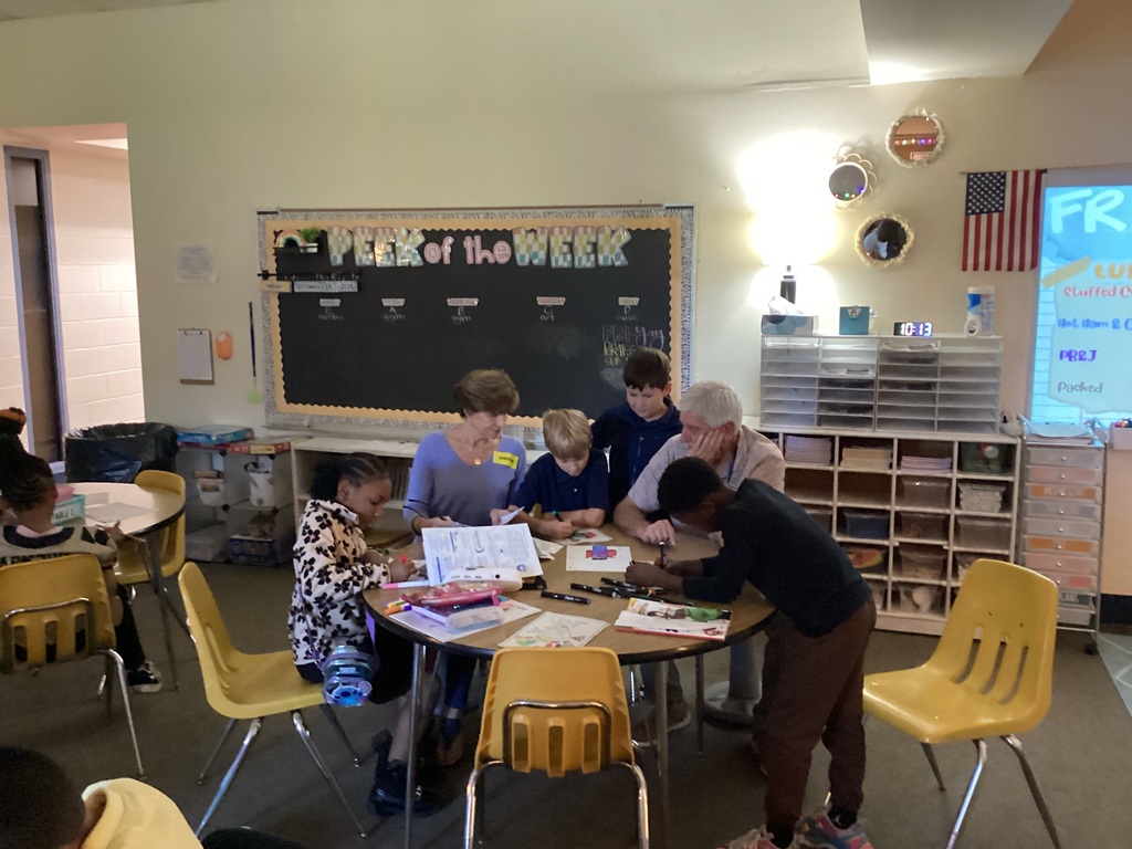 Grandparents pose with grandchildren