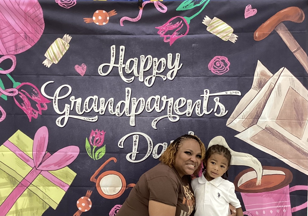 Grandparents pose with grandchildren
