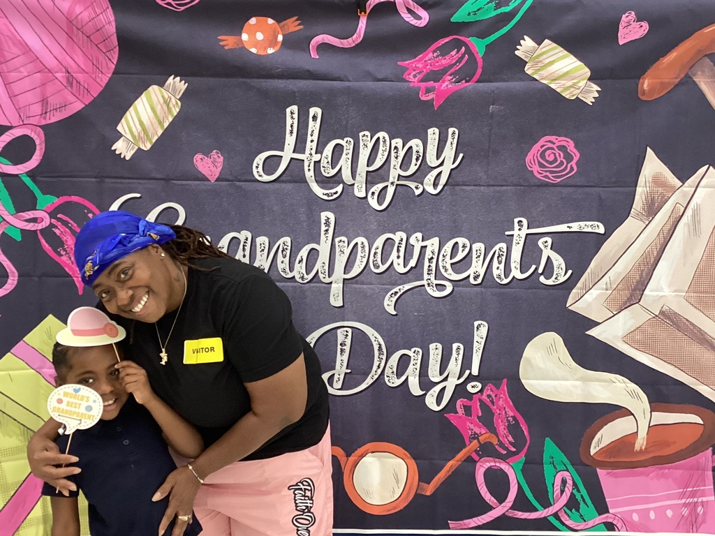 Grandparents pose with grandchildren