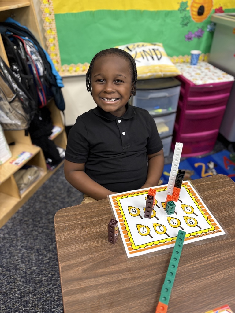 Student counting ten objects in a set