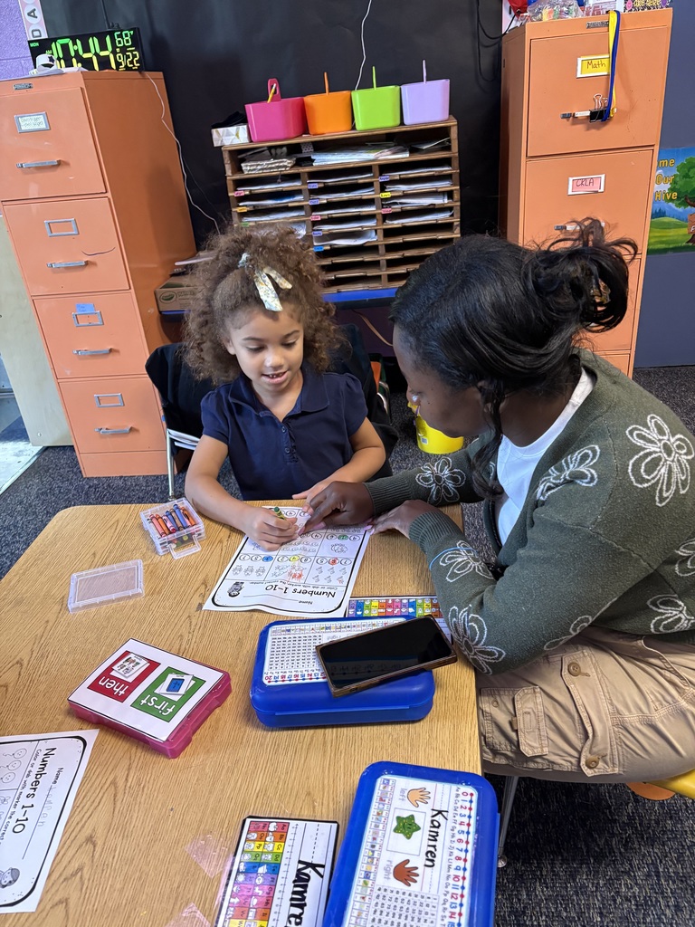 Teacher and students counting in a set