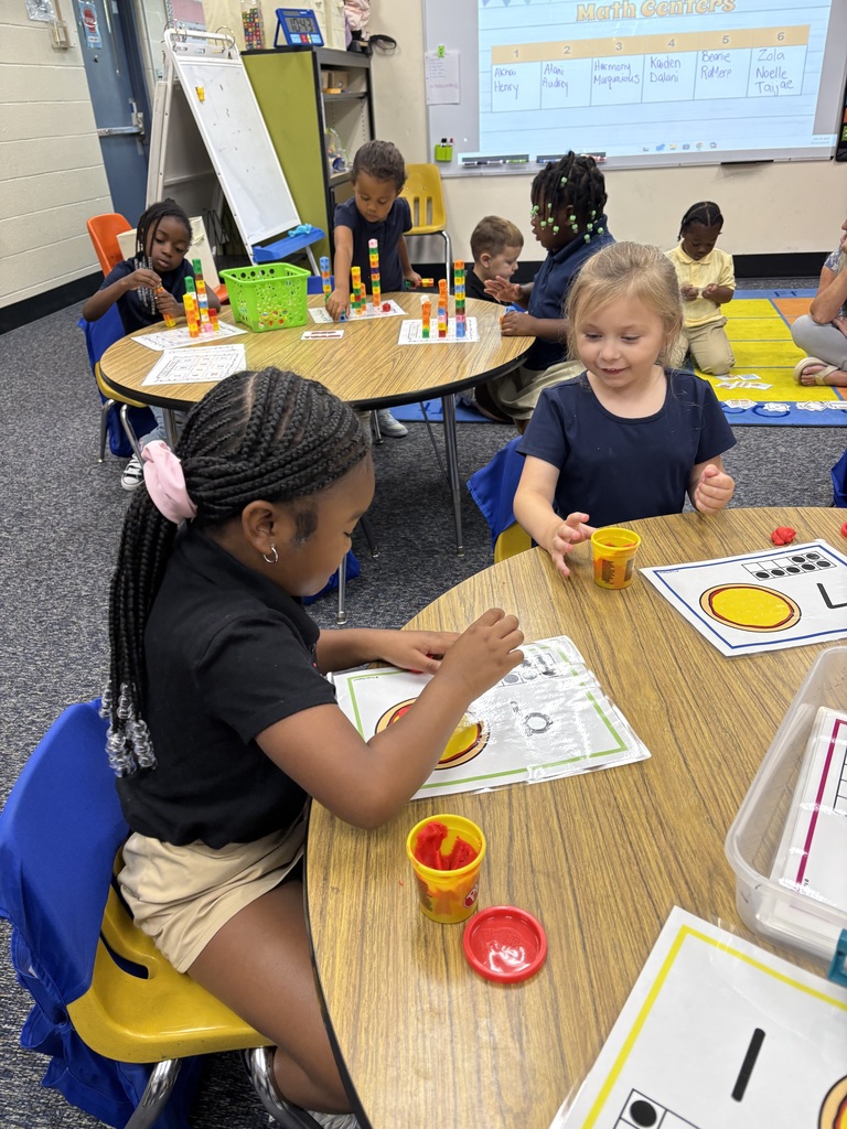 Student counting ten objects in a set