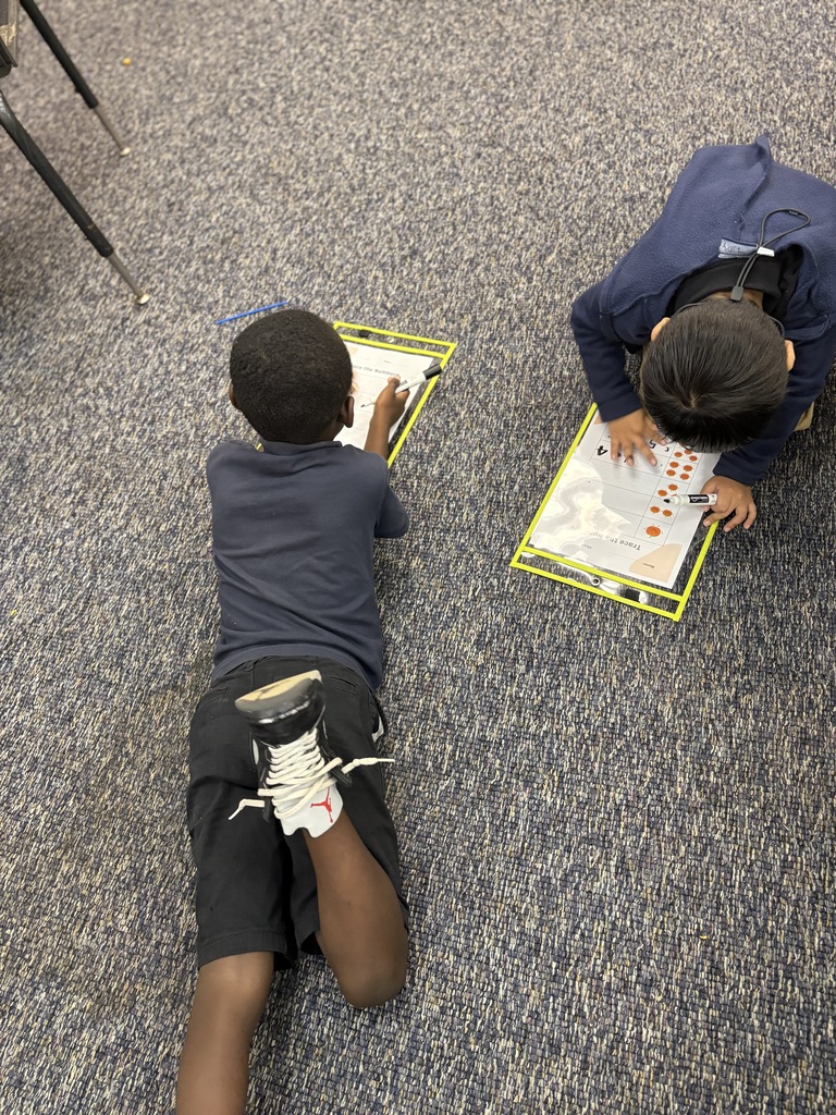 Student counting ten objects in a set