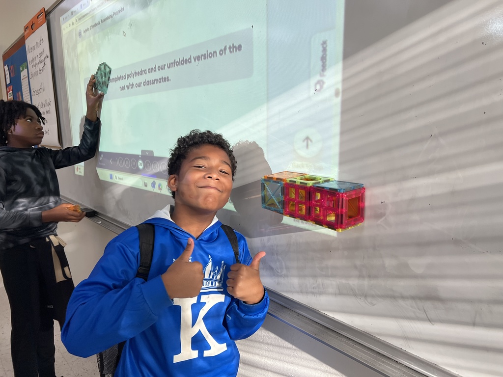 6th grade math created polyhedra from tiles