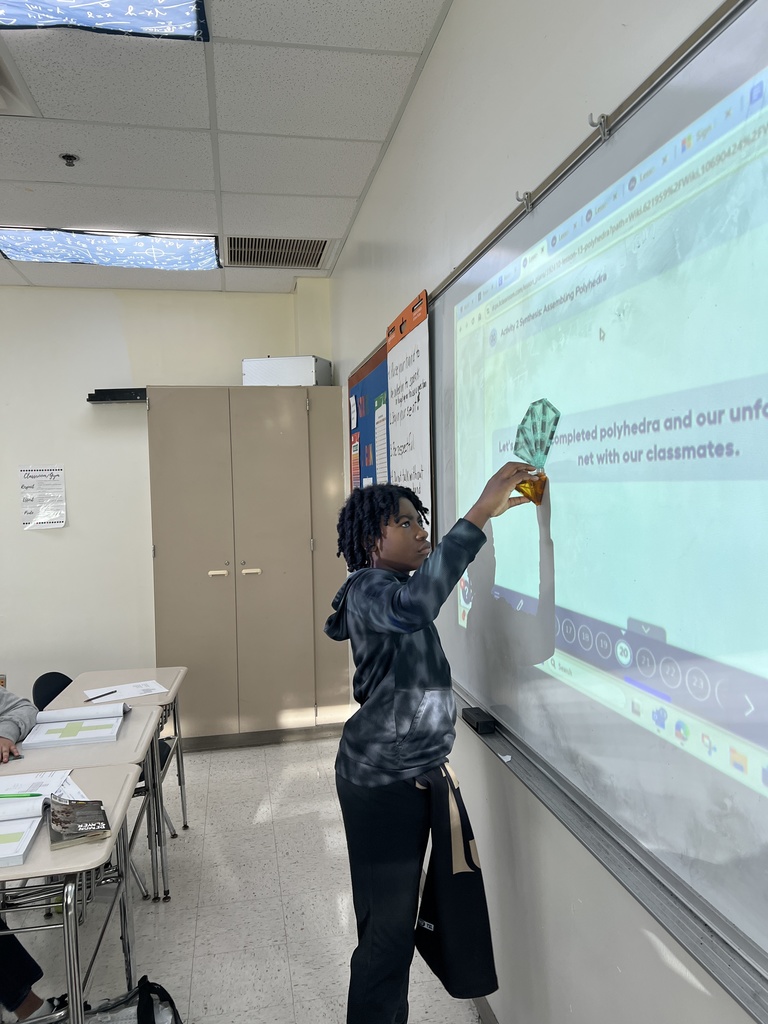 6th grade math created polyhedra from tiles