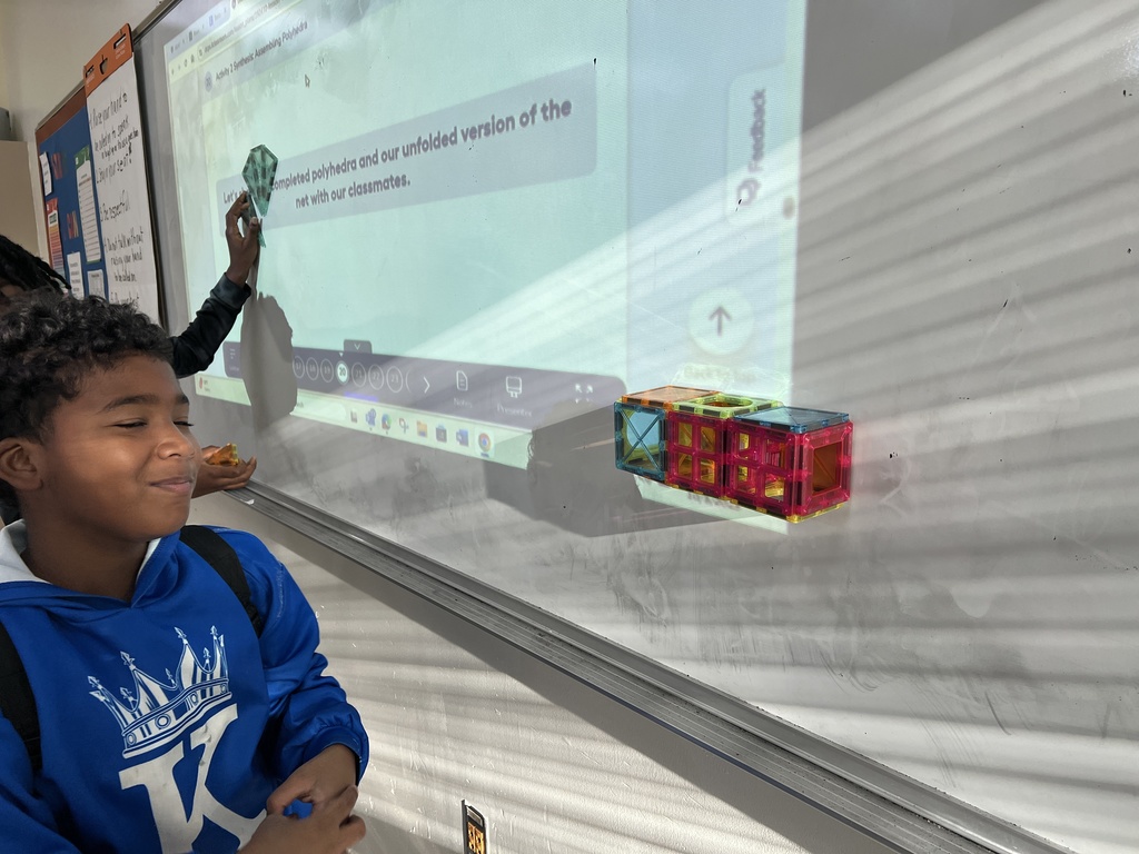 6th grade math created polyhedra from tiles