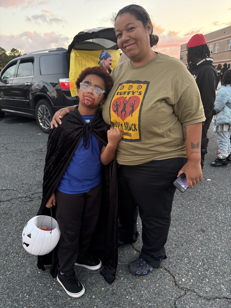 Student and parent at Trunk or Treat